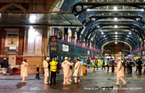 Workers in white inside Smithfield Market